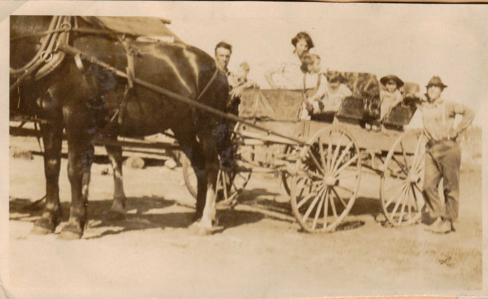 Hubert and Doris Brooks in Horse Drawn Wagon with Family Members